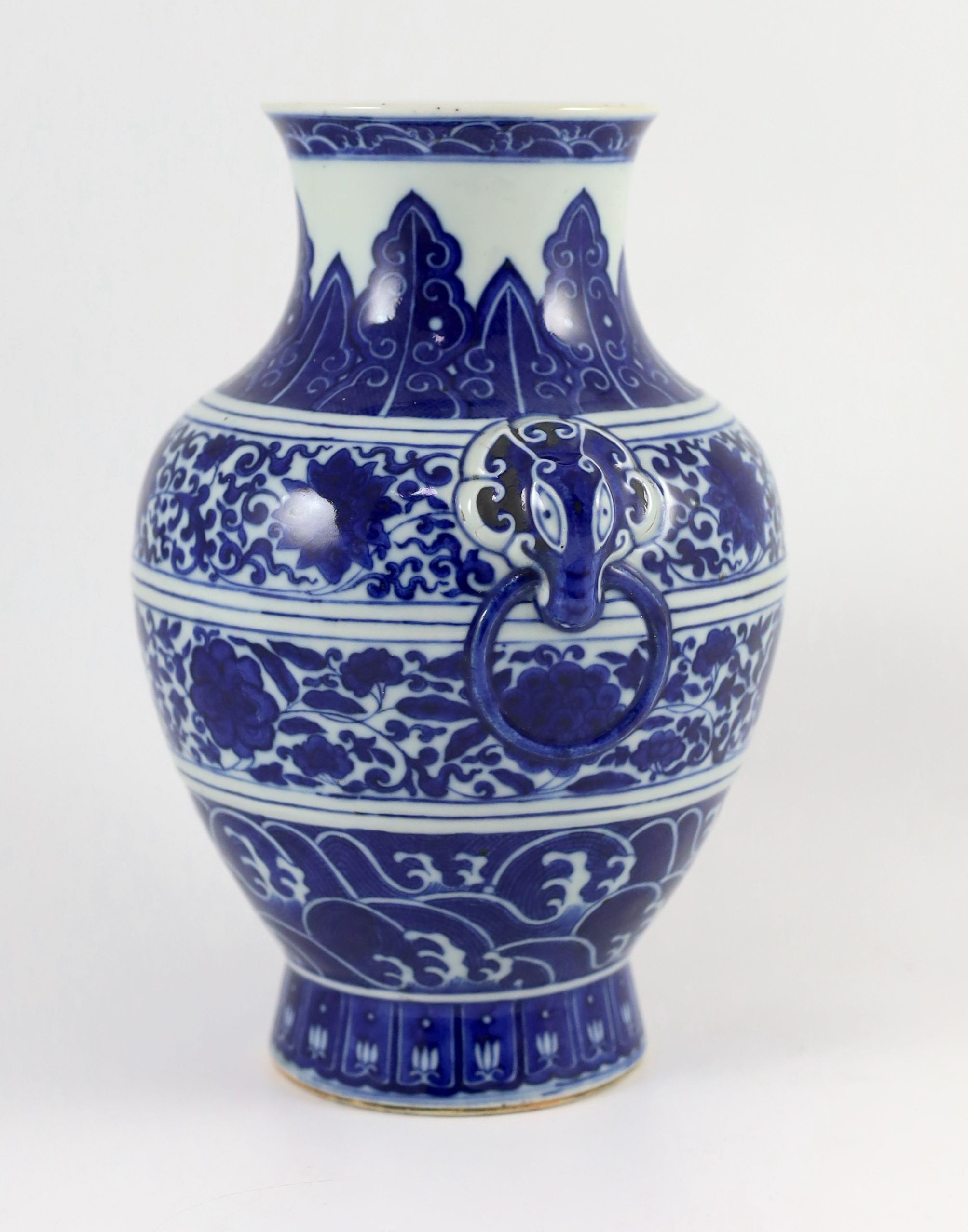 A Chinese archaistic blue and white vase, hu, Qianlong seal script mark but 19th century, 25cm high